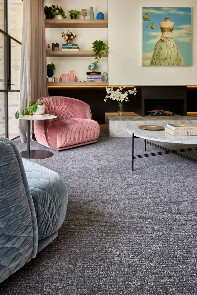Grey carpet in a living room with a pink armchair, Camberwell Floorworld