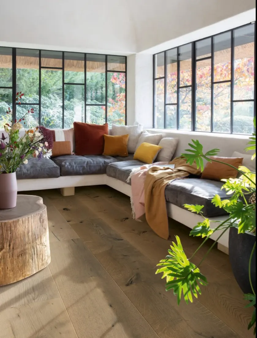 Oak timber flooring in a living room with a window seat, Camberwell Floorworld